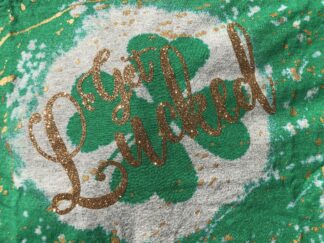 Green shirt with text get lucked