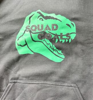 Black Dynosauros hoodie with green logo and squad goals in black glitter letters